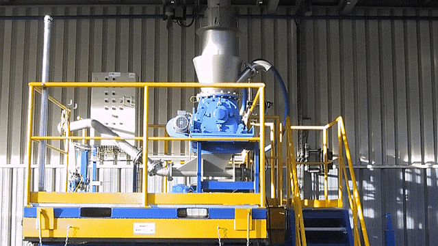 TBMA lined container loading rotary valve skid solutions